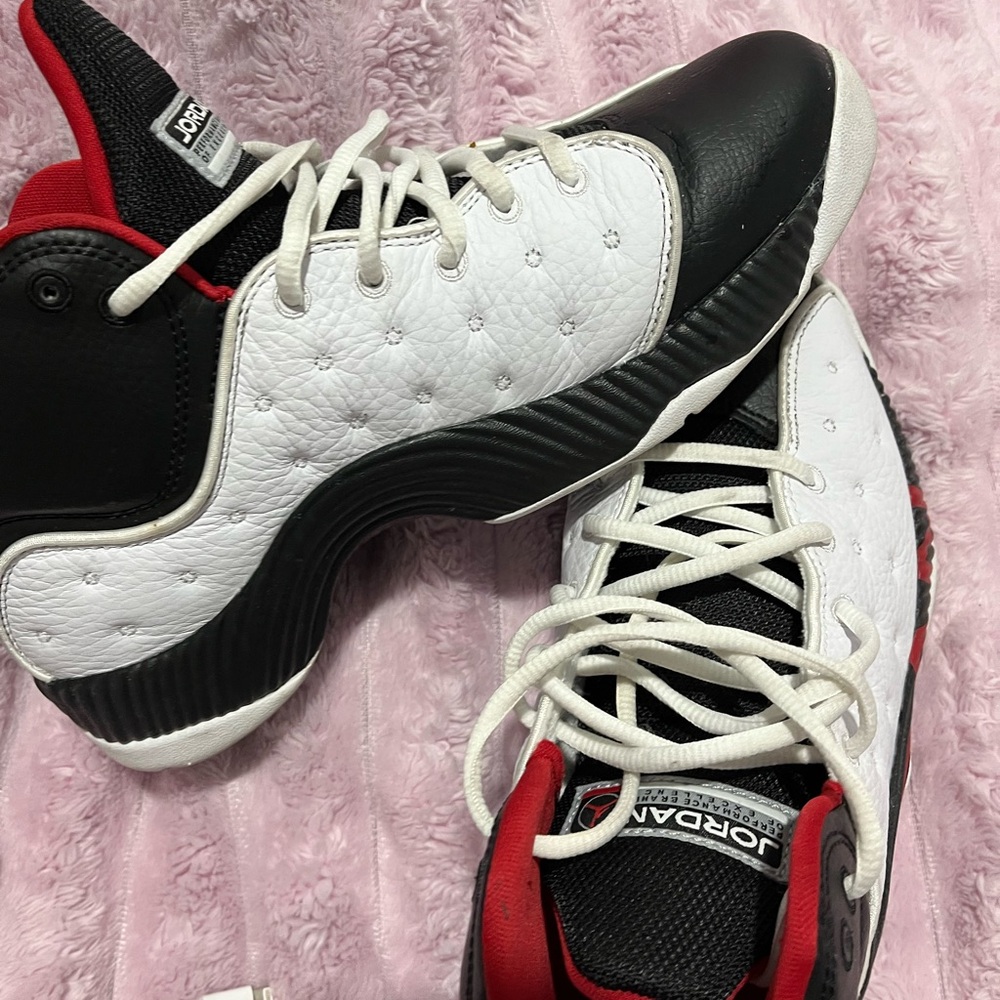 Jordan Black, White, and Red Athletic Shoes